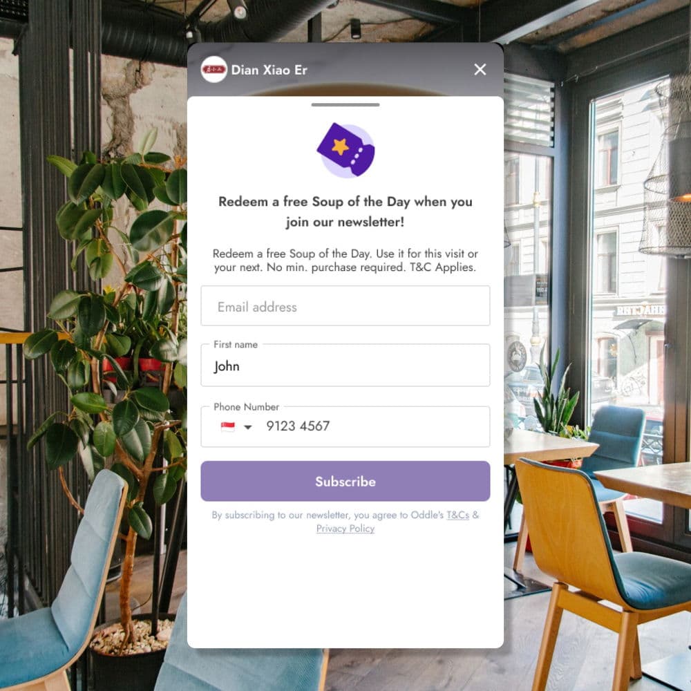 Phone showing email signup form in virtual lounge